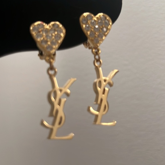 YSL Gold Heart Earrings The heart is full of rhinestones and then you have YSL.
